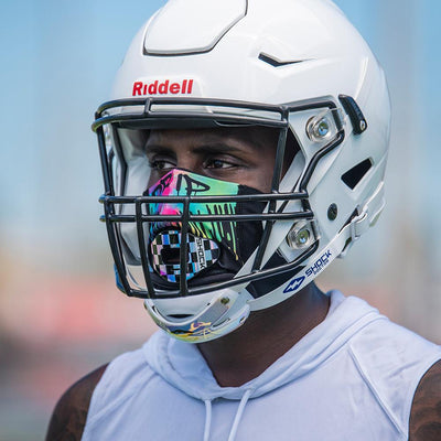 Drip Play Safe Face Mask Lifestyle Image  – Male Football Player With Helmet on Wearing Protective Safety Face Mask - Left Angle