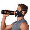 Black White Fang Play Safe Face Mask – Male Model Wearing Protective Safety Face Mask while Drinking a Hydration Water Bottle - Left Angle