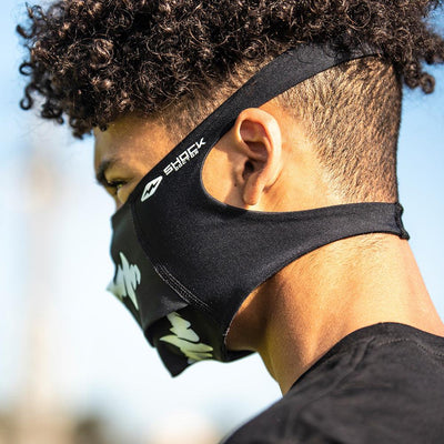 Black White Fang Play Safe Face Mask – Closeup of Male Football Youth Athlete Wearing Protective Safety Face Mask - Back Angle