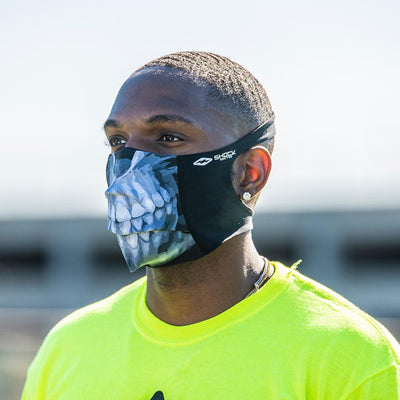 Skull Play Safe Face Mask Lifestyle Image – Male Football Player Wearing Protective Safety Face Mask – Left Angle
