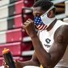 USA Stars & Stripes Play Safe Face Mask – Male Athlete Wearing Protective Safety Face Mask While Holding Water Bottle on the Bench – Front Angle