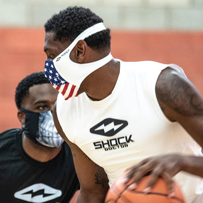 USA Stars & Stripes Play Safe Face Mask – Male Basketball Player Wearing Protective Safety Face Mask During Game - Left Angle
